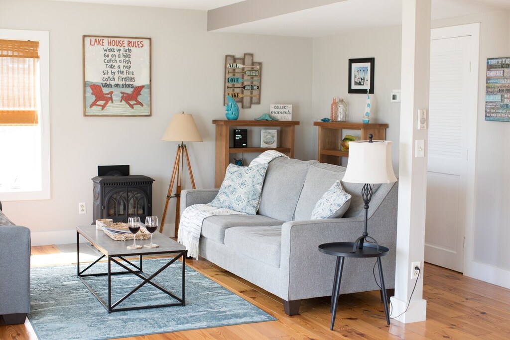 Downstairs Living Room- Cozy up with friends or family in this bright and welcoming space.