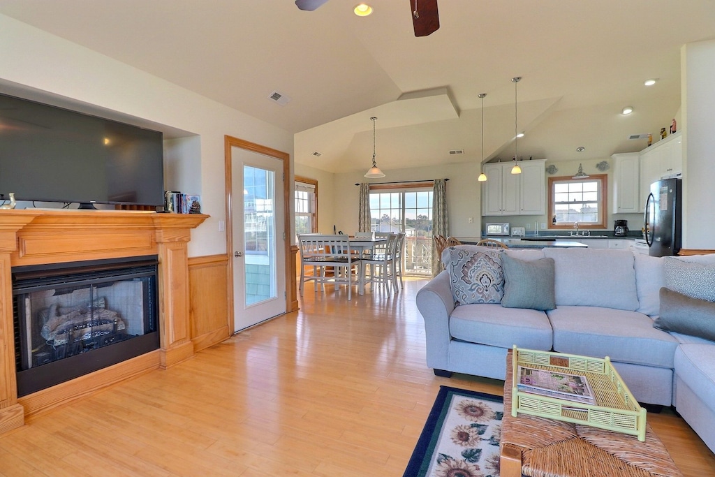 Relax in the spacious Top-Level Living Area! (Note: Fireplace is NOT for guest use.)