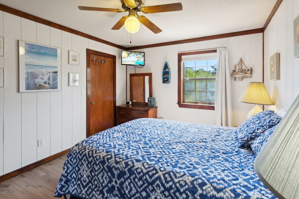 Settle into the Queen Bedroom with a Flat Screen TV when it's time to get some rest!