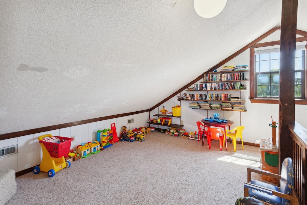 The Top-Level Loft is a wonderful recreation space with toys, a Flat Screen TV, and a library of games, movies, and books to enjoy!