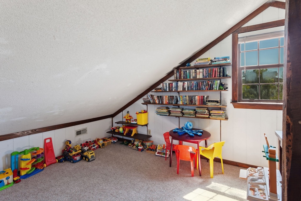 The Top-Level Loft is a wonderful recreation space with toys, a Flat Screen TV, and a library of games, movies, and books to enjoy!