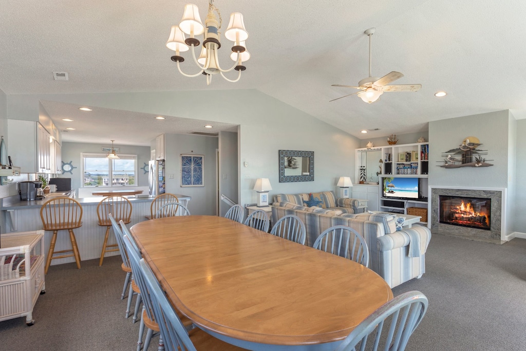 Living area with ocean views and fireplace