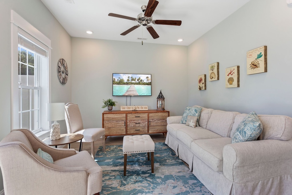 Relax in the spacious Living Area with a Flatscreen TV and plenty of comfortable furniture that makes every night movie night!