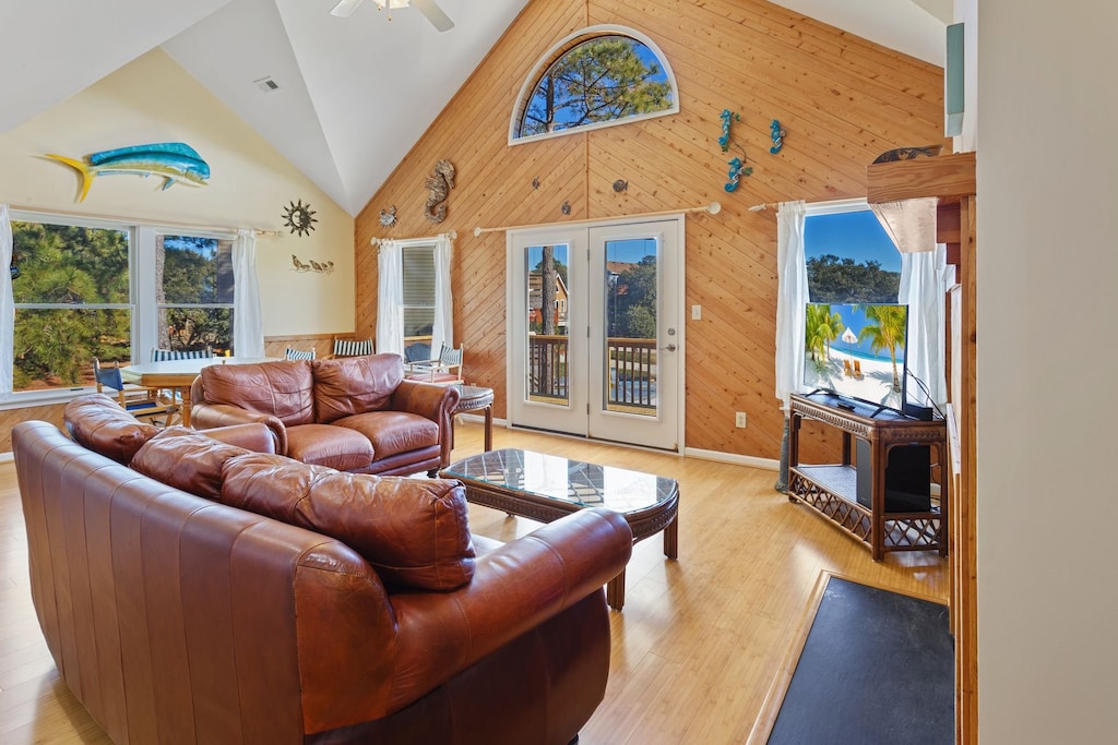 Relax in the Mid-Level Living Area with comfortable furniture and a large, flat screen TV!