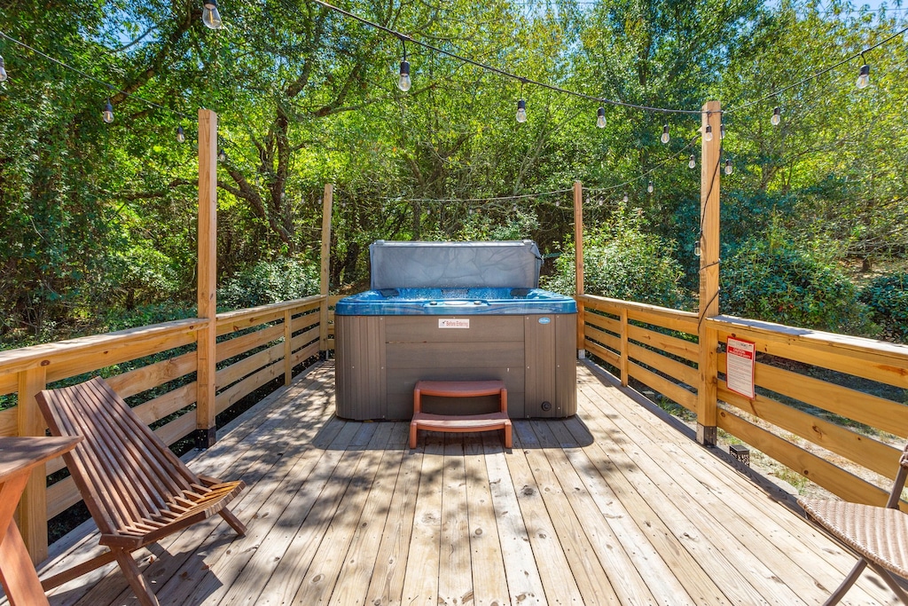 Relax in the bubbly Hot Tub after a day at the beach.