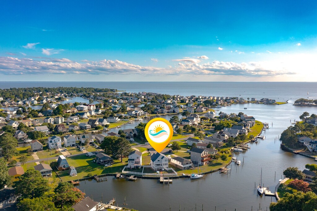 Enjoy amazing sunsets and beautiful skies at this canalfront home.