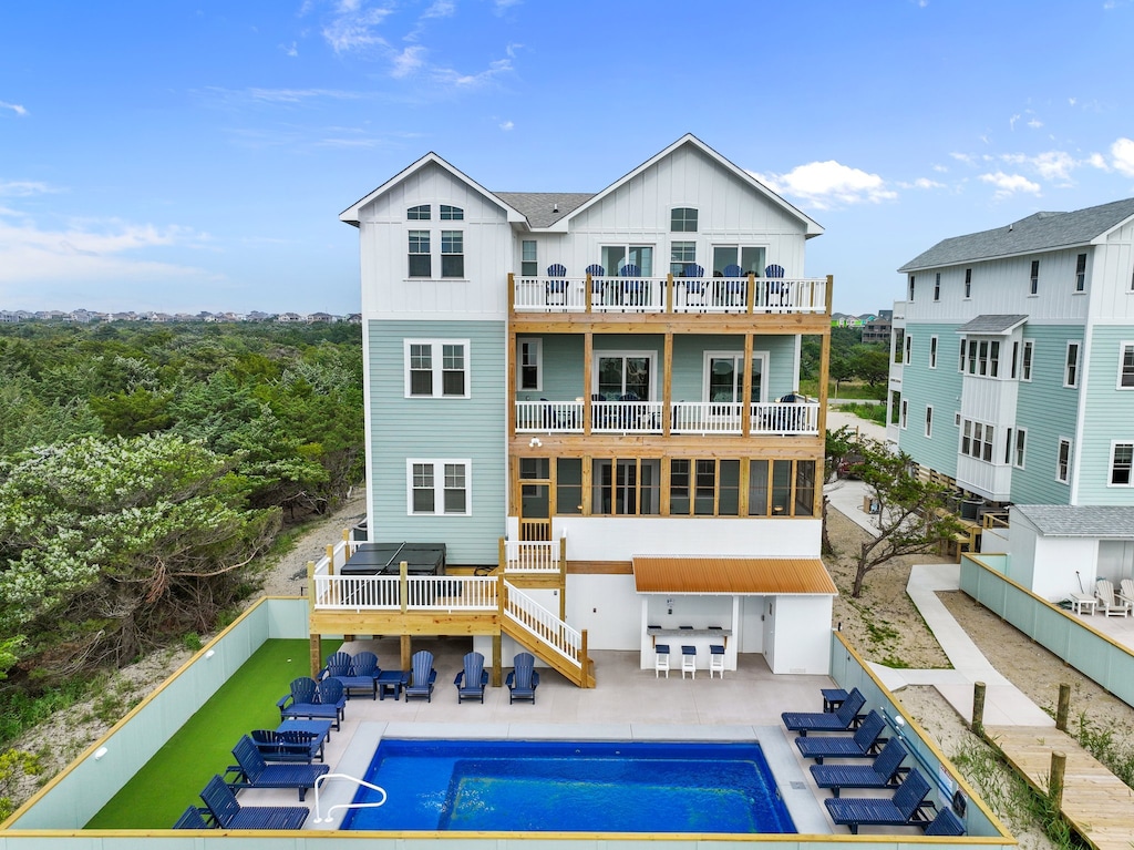 Welcome to Seas the Breeze I, a beautiful 10-Bedroom, 13-Bathroom (10 full, 3 half) soundfront retreat in the heart of Avon, where luxury and coastal charm converge for the ultimate Outer Banks getaway.