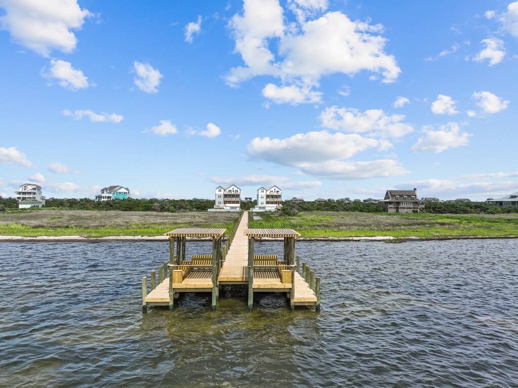 Enjoy the Private Soundfront Dock with a kayak launch and benches.