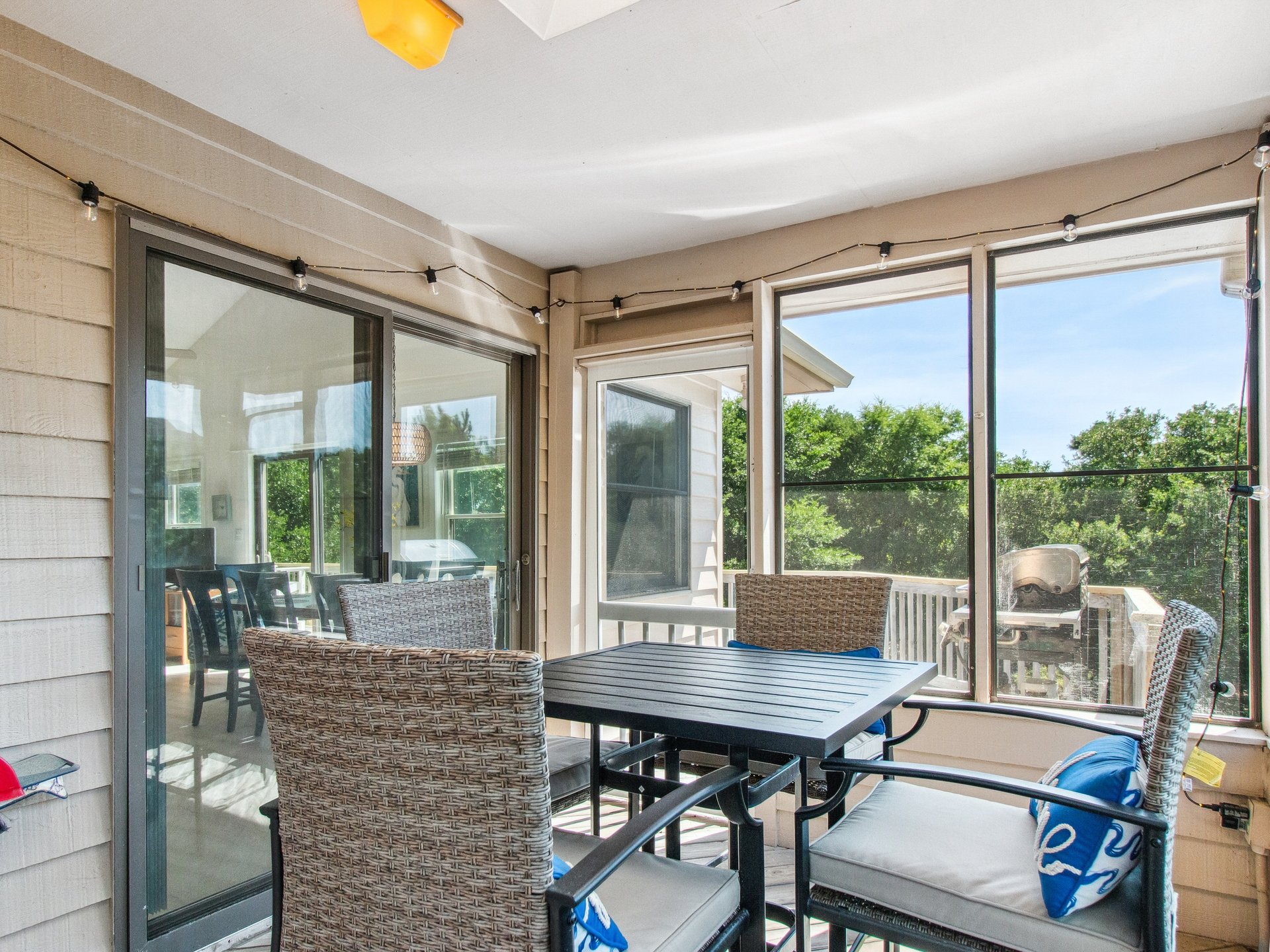 Enjoy al fresco dining out on the Screened-In Porch. Enjoy al fresco dining out on the Screened-In Porch.