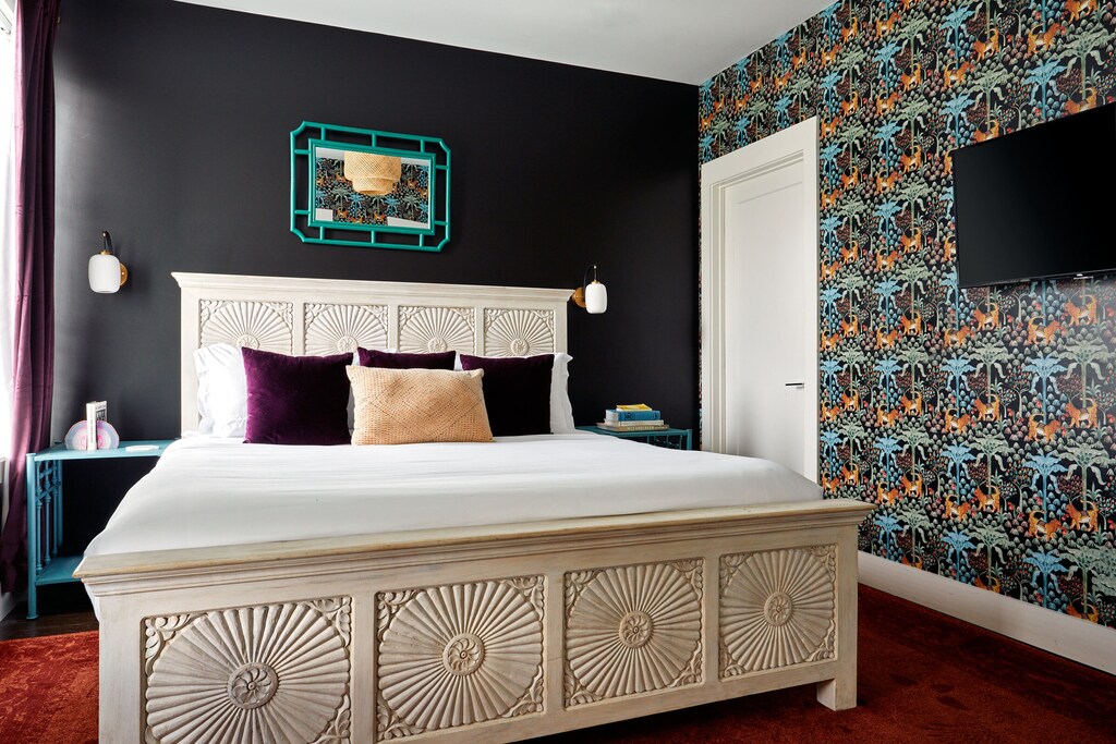 This King size room is cozy and ready for you to stream your favorite show!