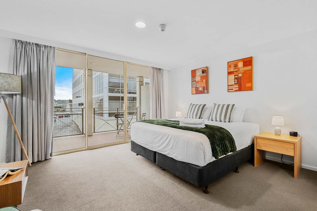 Main bedroom with comfy King size bed, ensuite and private balcony.