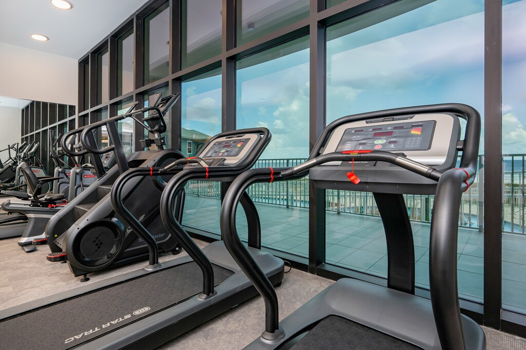 Get in your workout with modern fitness equipment and stunning views from this bright gym space