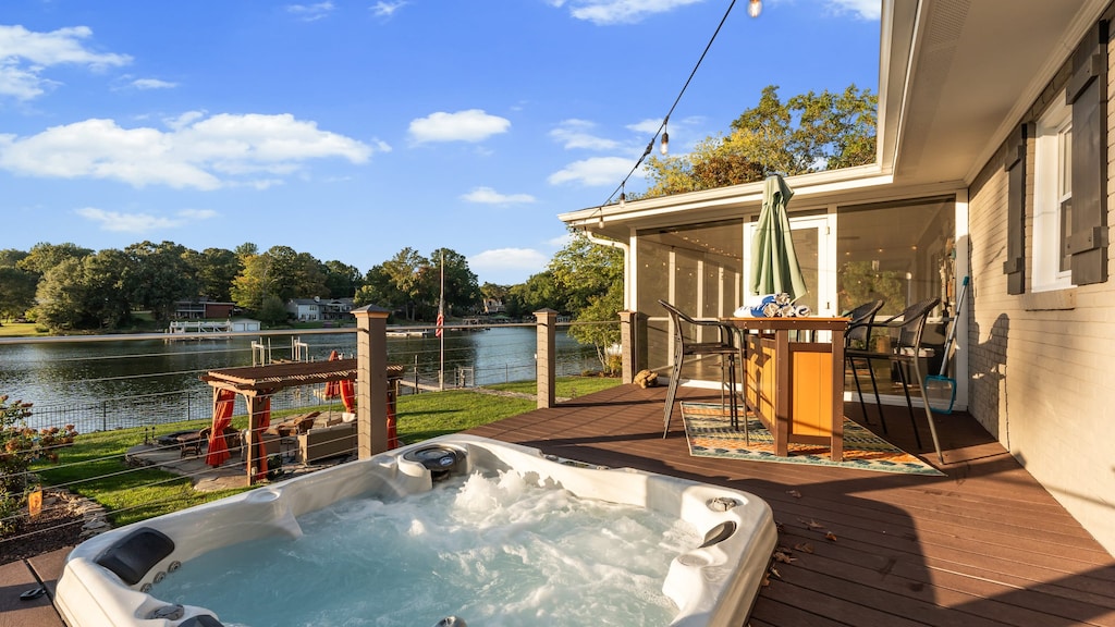 Enjoy morning coffee on the deck or a sunset soak in the hot tub with direct water access.