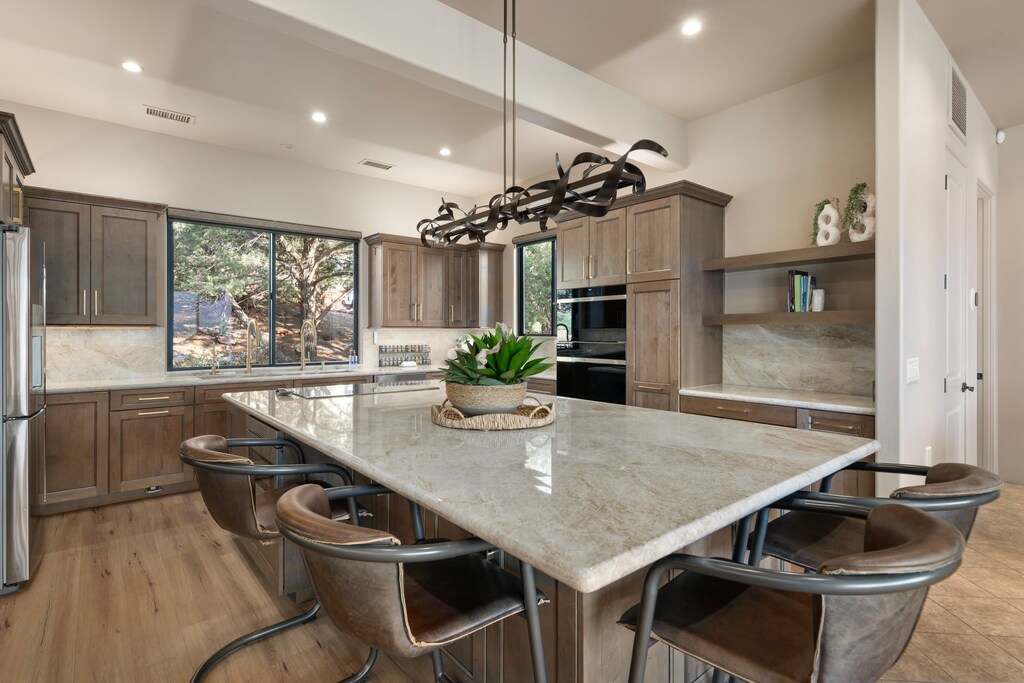 Gourmet chef's kitchen with high end appliances.