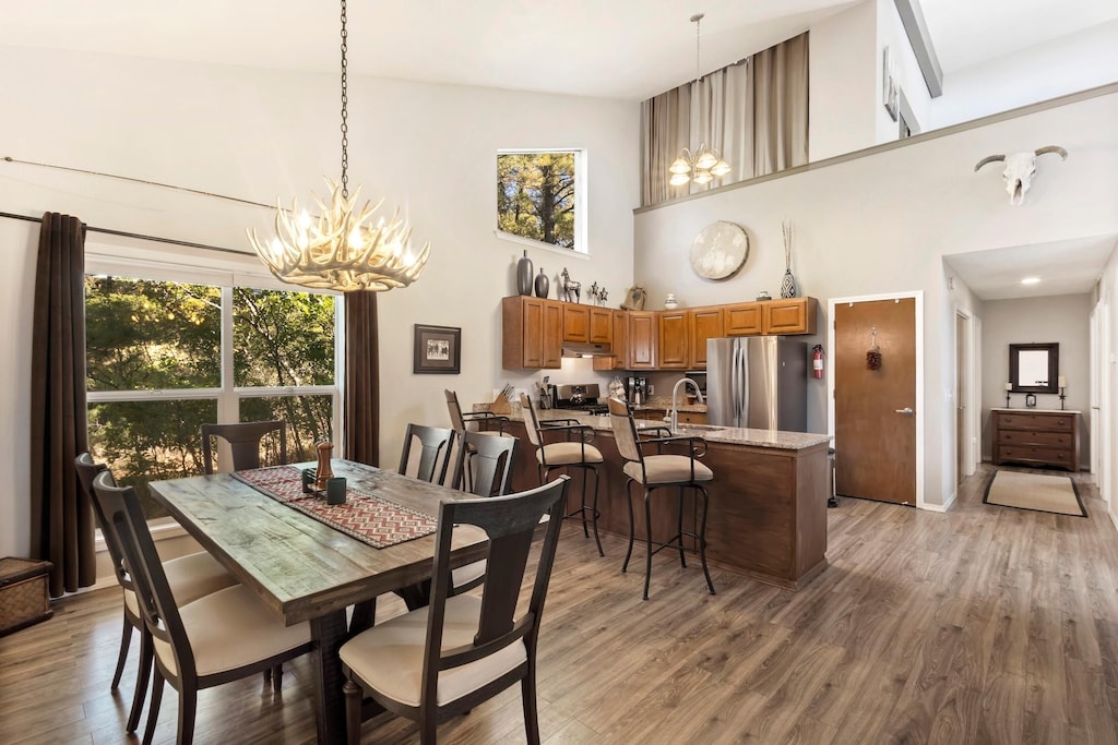 Fully equipped galley kitchen with stainless steel appliances, granite countertops.  Open to the dining area and living room. 