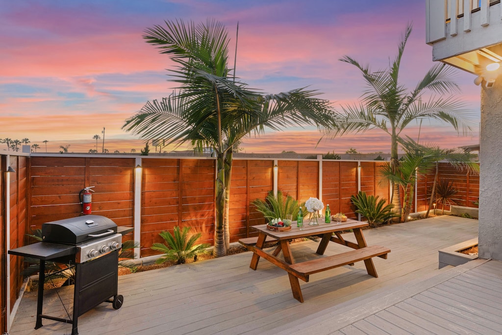 BBQ grill and al fresco dining table.