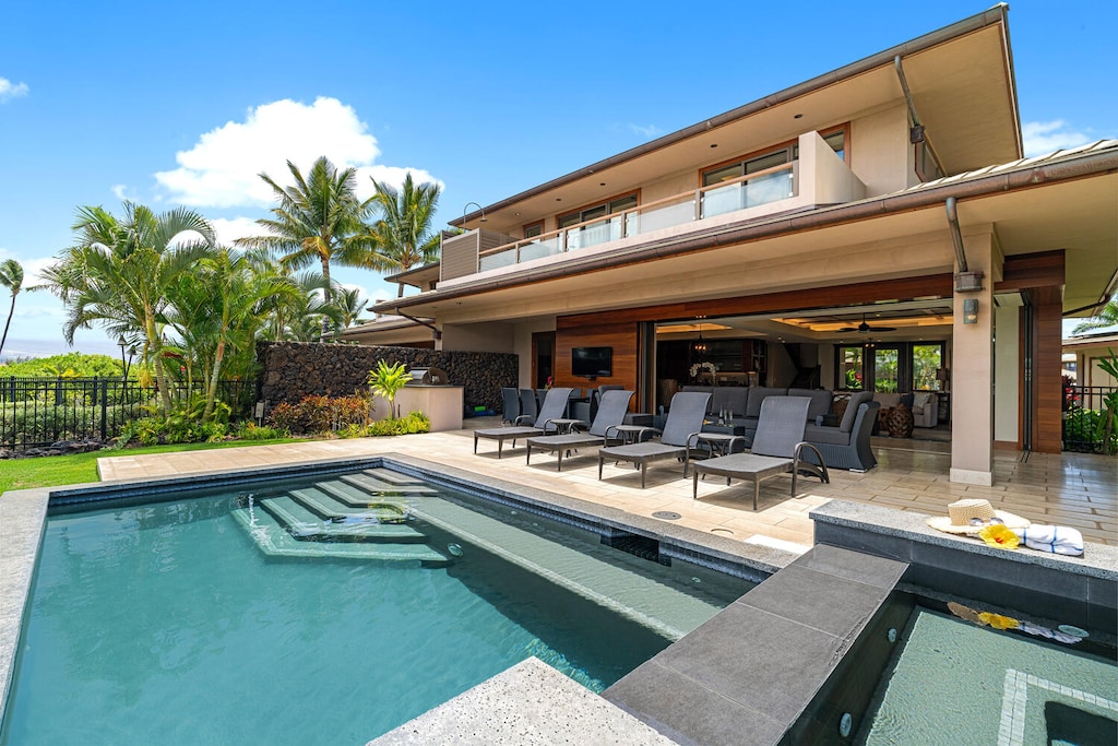 Spend your days soaking up the sun with a backdrop of Mauna Kea and swaying palms.