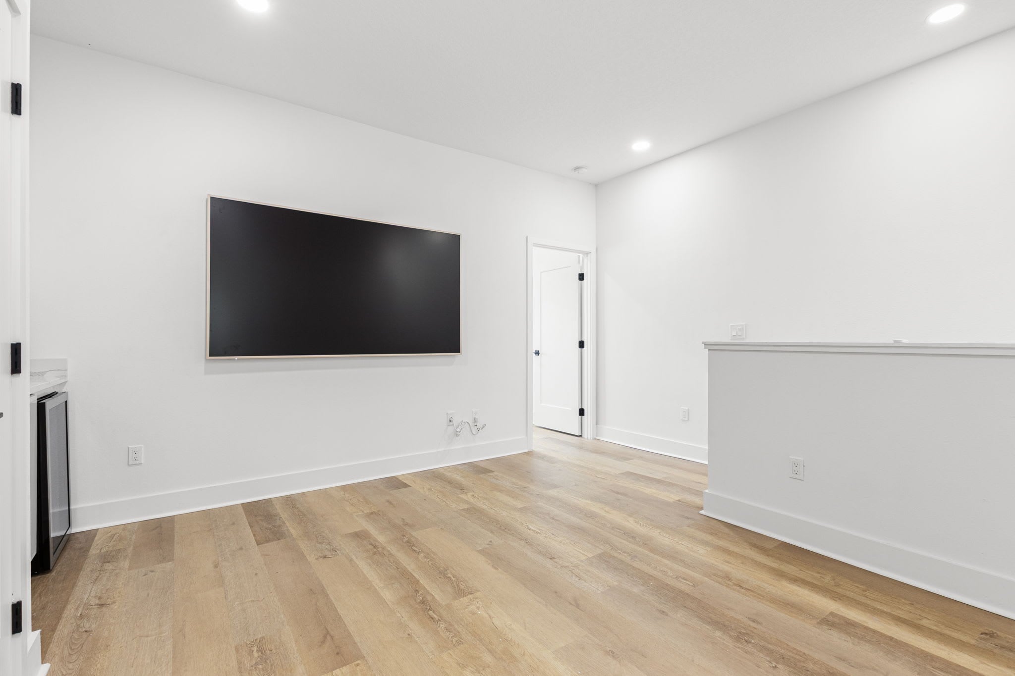 Built-in Wall TV in Upstairs Lounge Area Built-in Wall TV in Upstairs Lounge Area