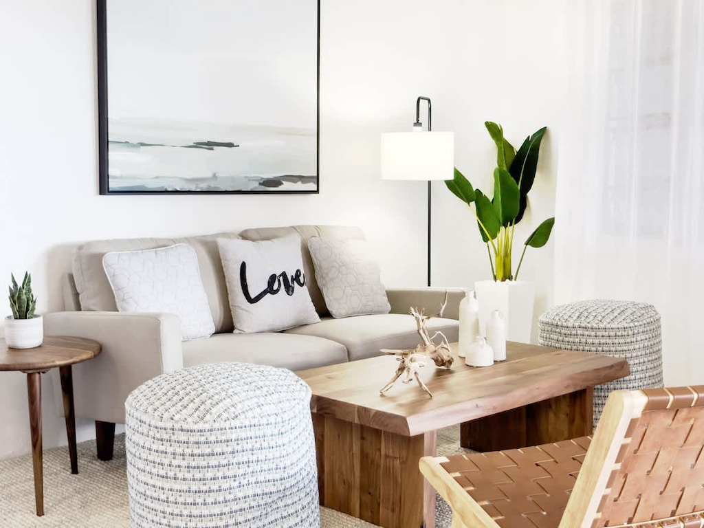 Charming living room with cozy seating and stylish décor. Ideal for a relaxing retreat!