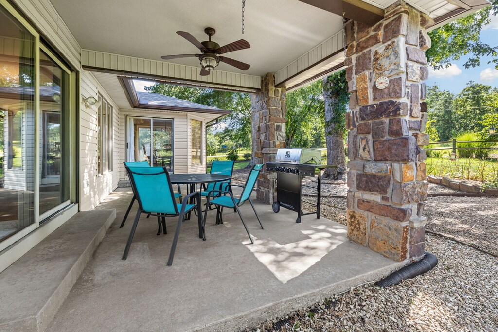 Peaceful backyard with grill and table!