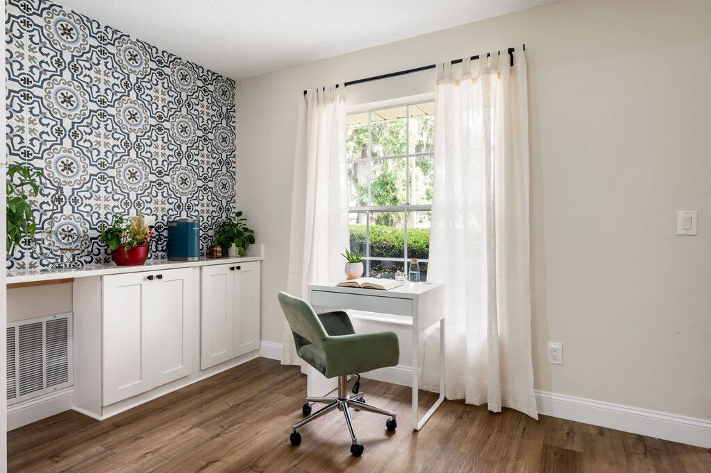 Enjoy a dedicated workspace to focus on your tasks. Experience the versatility of this space. 