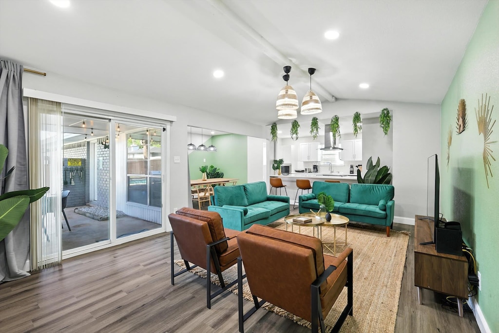 With touches of decorative greenery and plenty of seating, this living room is the perfect place to unwind after a long day and enjoy time with your companions. 