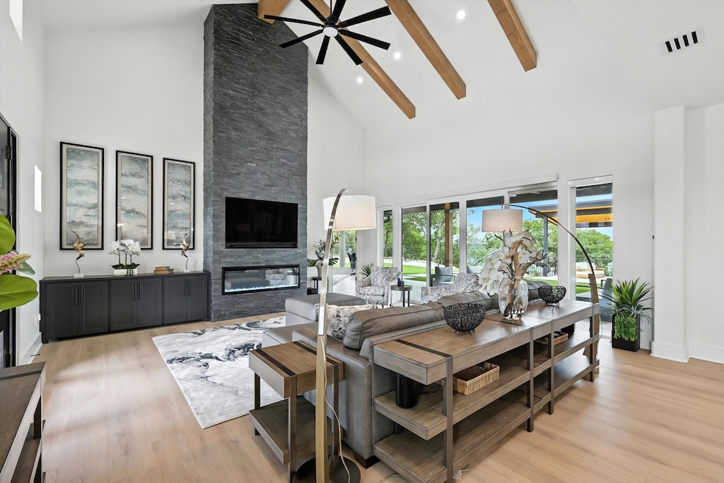 Tastefully furnished with high ceilings and a centerpiece stone fireplace, you’ll find yourself immediately relaxing as you settle into this grand living room.