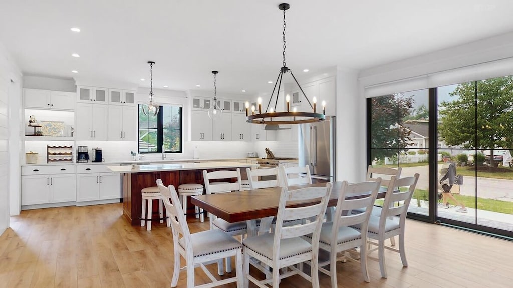 Chef's dream, fully equipped kitchen with seating for 12 people: 8 at the dining table and 4 at the island.