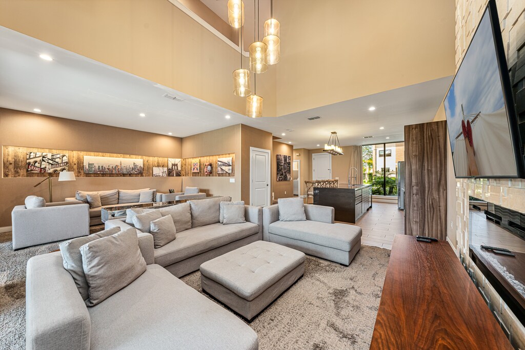 Enjoy open-concept spaces with plush seating, perfect for relaxing and enjoying comfortable movie nights.