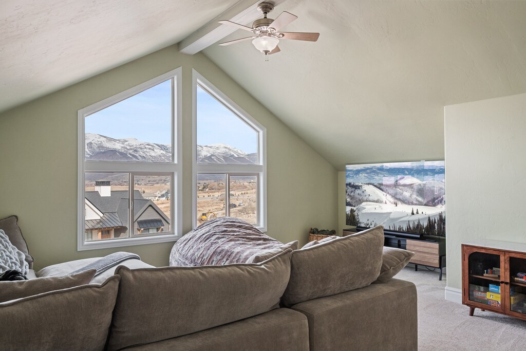 A huge plush sectional and 85" Smart TV with Amazing Views of the Wasatch Back