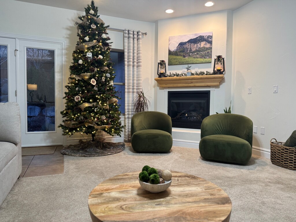 Step into a comfy and stylish primary living room with fireplace, and plush sectional