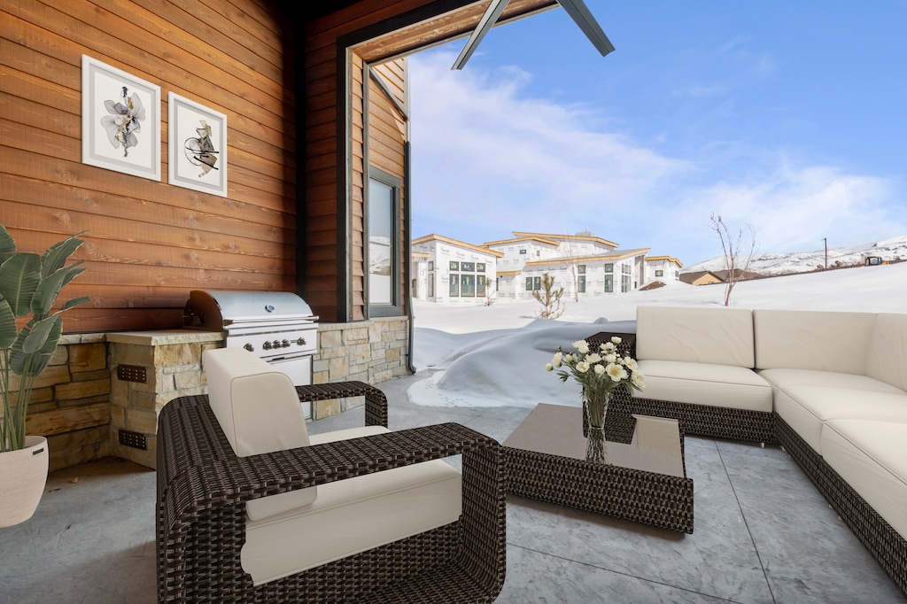 Rear deck looking North into Red Ledges, A beautiful Firepit, built in BBQ & large outdoor ceiling fan make this a great place to relax on warm summer evenings or for morning coffee.  This picture has been virtually staged, actual furniture may vary