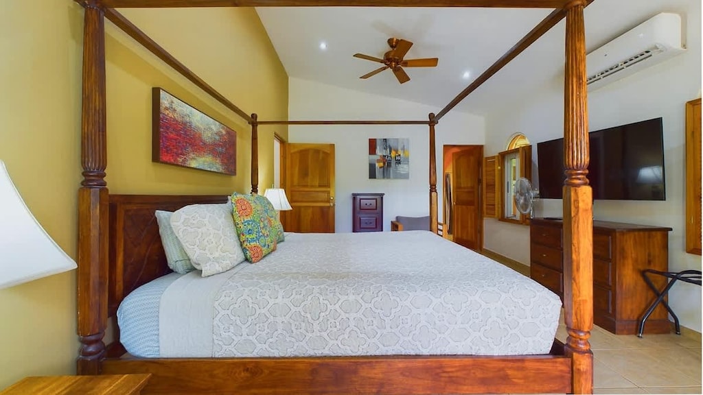 Master bedroom with a king bed