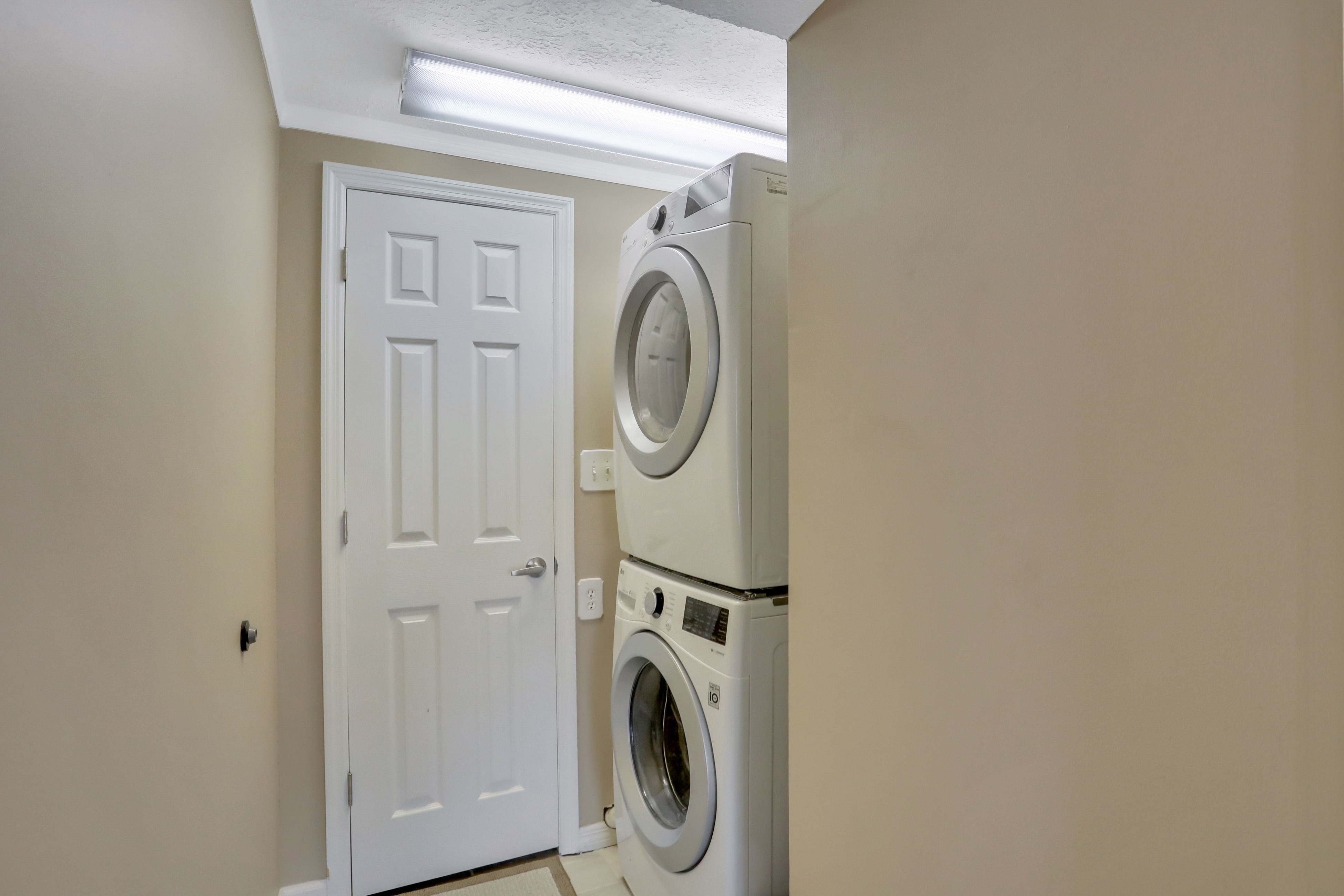 Snowbird-friendly elegant home with waterfront location, pool, grill, fireplace