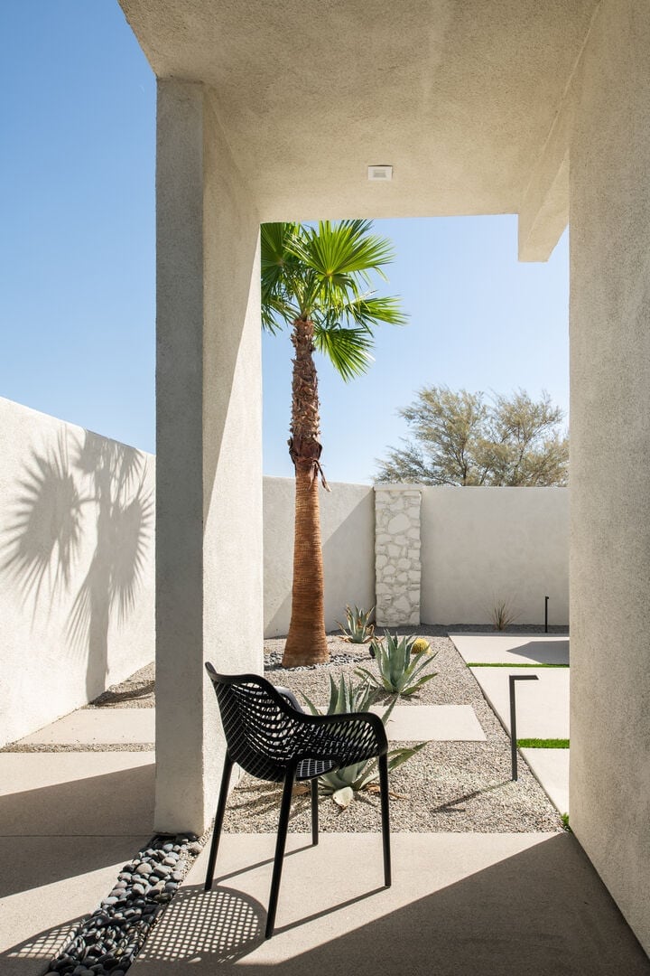 A moment of zen. Enjoy the shaded, private covered patio with desert landscaping—a perfect spot for quiet reflection.