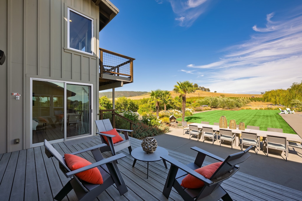 Enjoy the fresh air and open skies on this well-appointed patio.