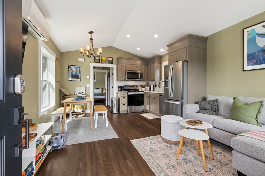 Open concept kitchen, living, and dining rooms