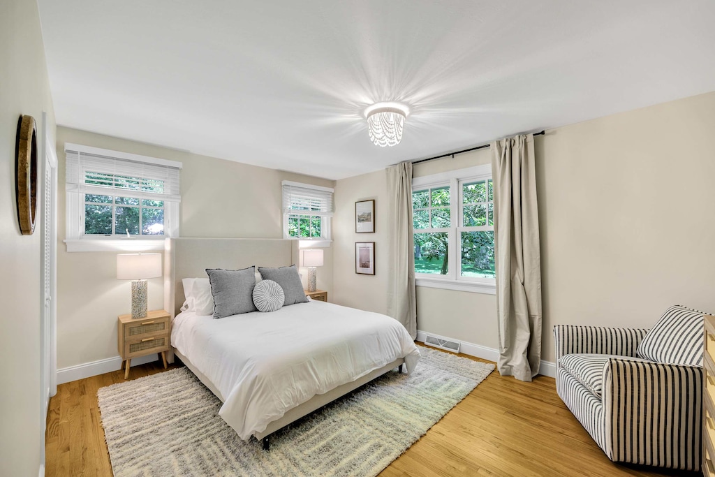 Light-filled retreat with two large windows and calming neutral tones.