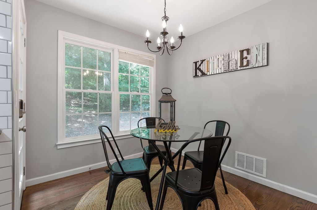 Breakfast area in kitchen with door access to rear deck.