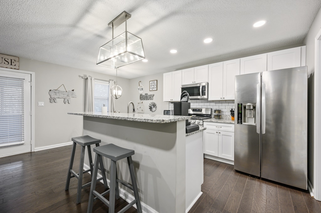 Kitchen with stainless steel appliances