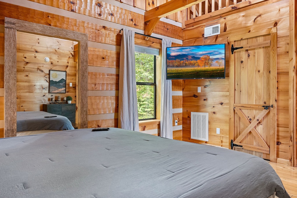 King bed with full size mirror and tv