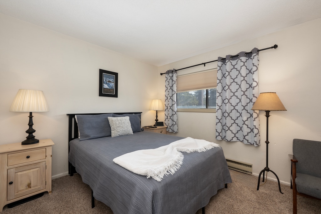 Settle into your cozy bedroom with soft linens and warm lighting that creates the perfect retreat after your adventures.