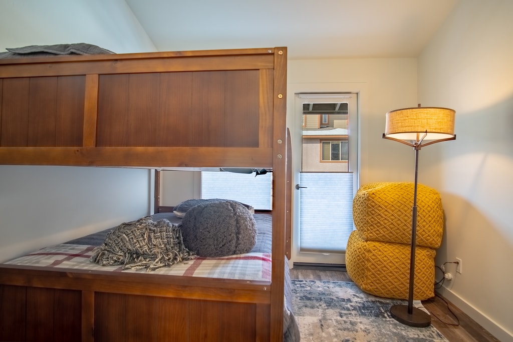 Upstairs bunk room with deck