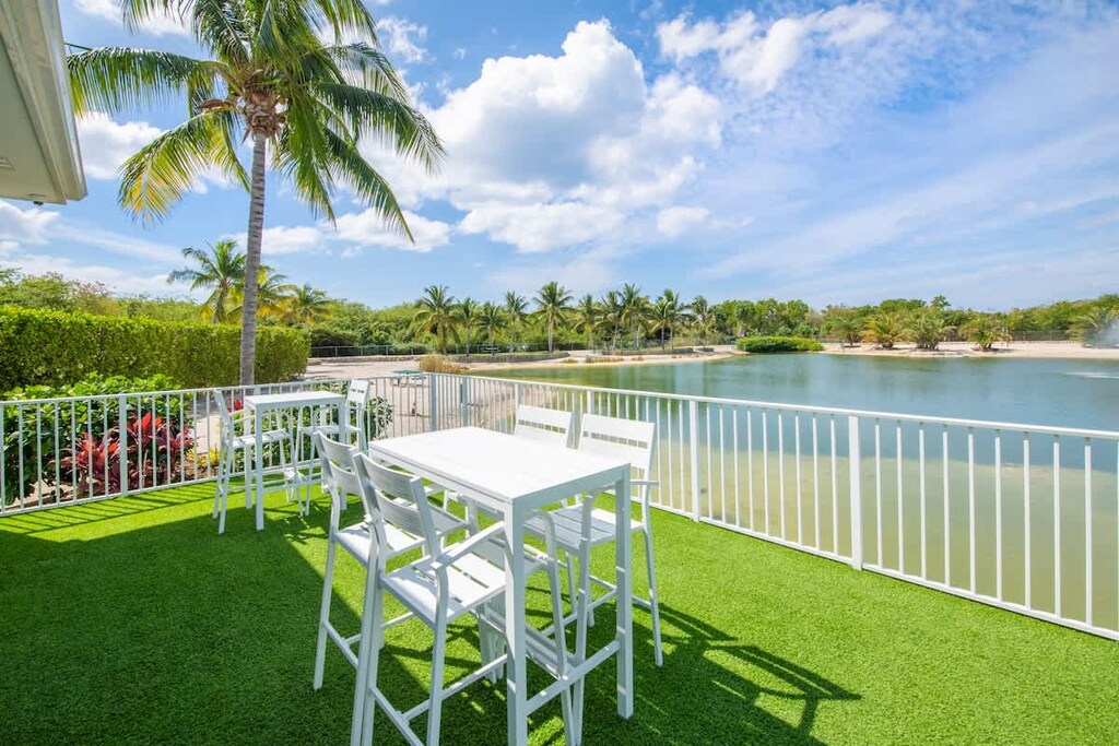 Seating near the Summertime Suites lake 