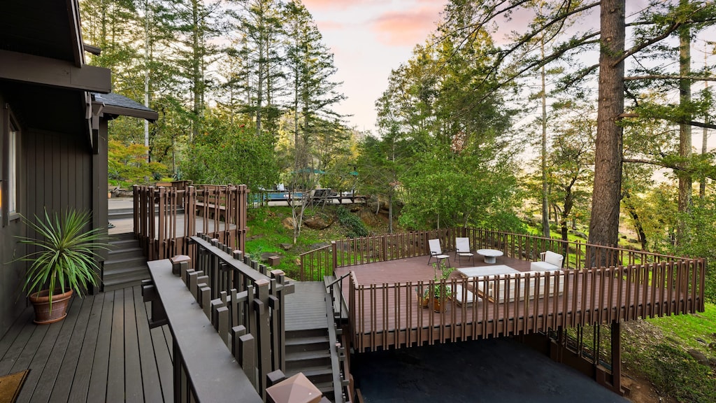 Unwind and enjoy forest views from the deck.