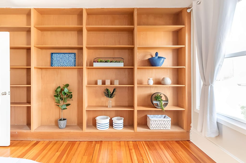 Unique shelving in the primary bedroom