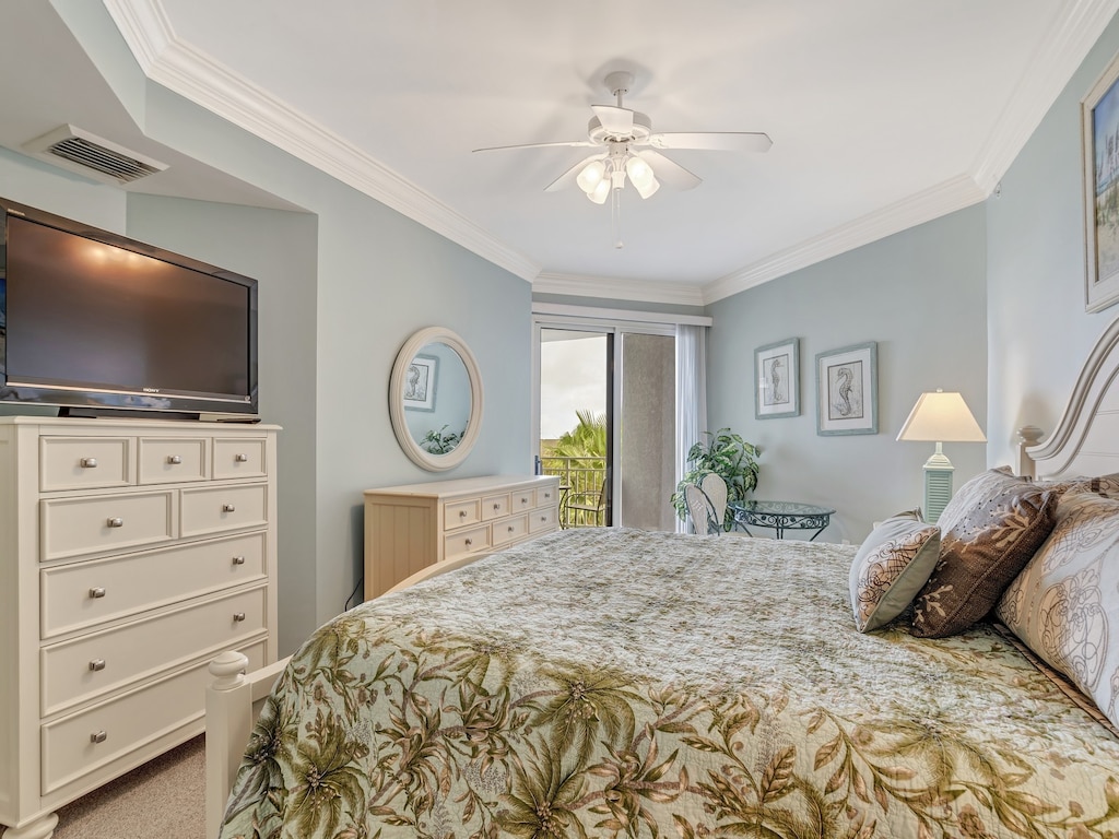 Master Bedroom with King Bed and Private Balcony at 2404 Sea Crest