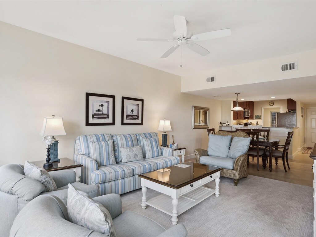 Living Room, Dining Area and Kitchen at 402 Captains Walk
