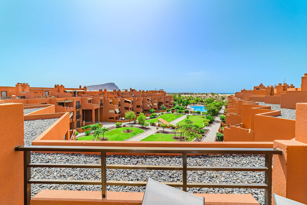 Panoramic Balcony Overlooking Pool, Gardens & Sea — Your Morning Coffee with a View