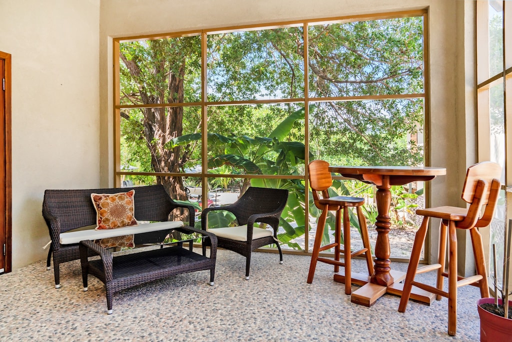 Relax in the screened in porch